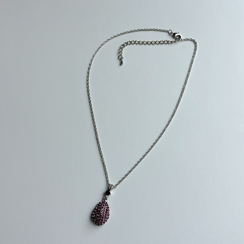 Silver necklace with purple gemstones